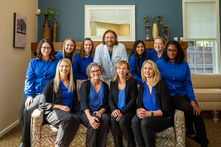 team-on-couch-9-2021-pickens-family-dentistry.jpg